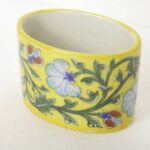 ARTS & CRAFTS BLUE POTTERY CUTLERY SAND, YELLOW BASE MULTI COLOUR FLORAL HAND PAINTED BOWL