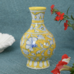 ARTS & CRAFTS BLUE POTTERY DECORATIVE HANDI SHAPED LEMON YELLOW VASE (BLUE & WHITE FLORAL DESIGN)