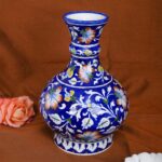 ARTS & CRAFTS BLUE POTTERY VASE, BLUE BASE MULTI COLOUR FLORAL HAND PAINTED VASE